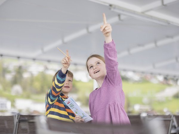 Children search for coins