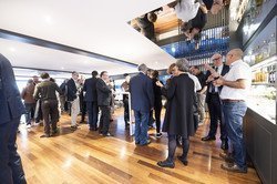 Guests standing in the main saloon on the MS Rigi