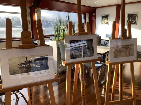 Picture exhibition with framed photos on easels