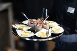 Snacks are served on a tray.