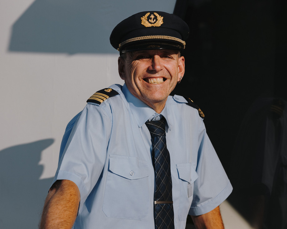 Portrait of a skipper at the railing