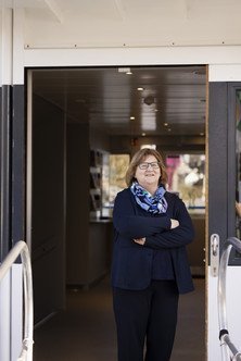 Employee standing in the doorway