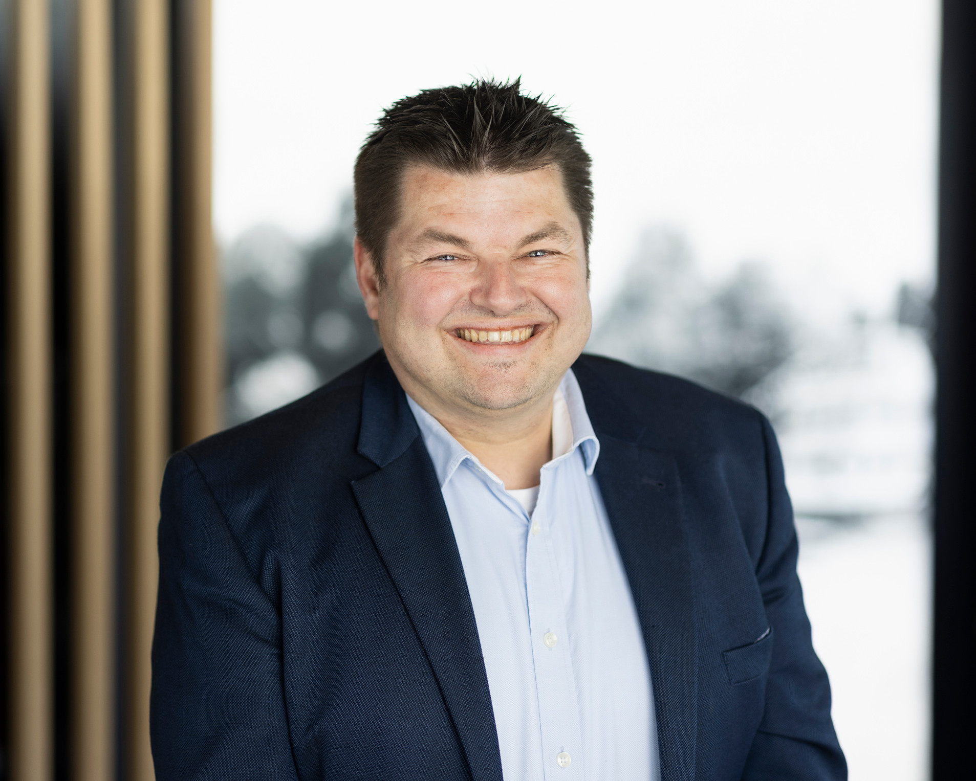 Porträtfoto von Geschäftsführer Philipp Hofmann